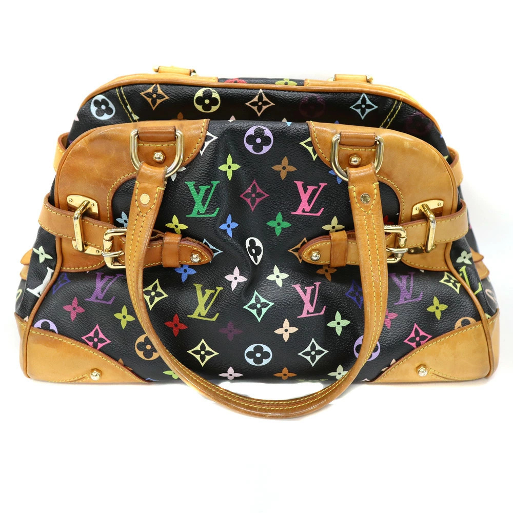 Louis Vuitton Claudia Handbag Brown